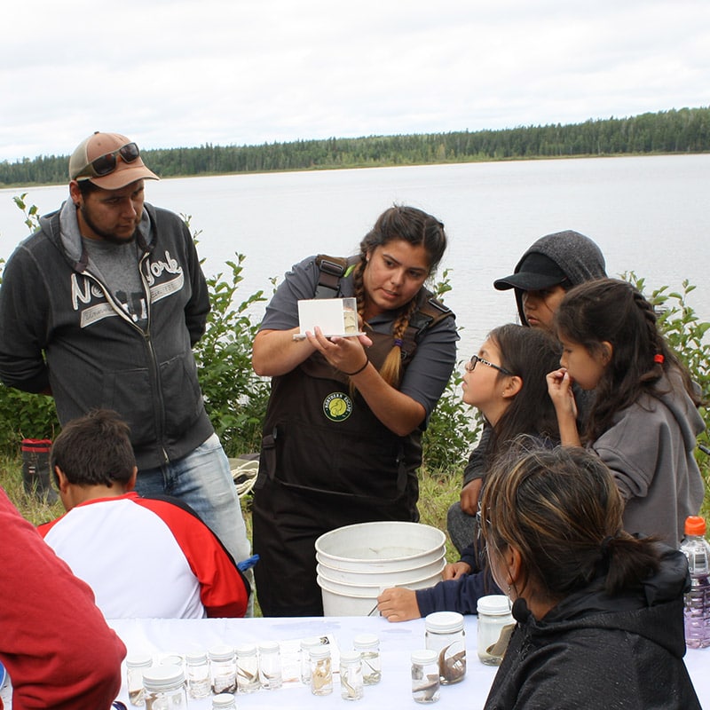 AOFRC team member identifying fish with students